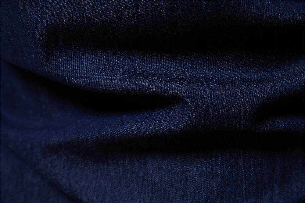 "Chemise en Denim pour Hommes TailorFlex" can be rewritten as "Chemise en Denim Homme TailorFlex".