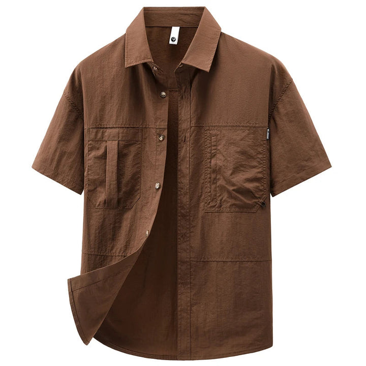 Chemise Active en Nylon Marwick" can be rewritten as "Chemise Marwick en Nylon Actif.